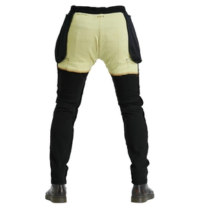 Men's black motorcycle jeans featuring protective yellow Kevlar lining and ergonomic design