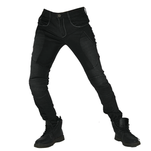 Detail of slim motorcycle jeans with stretch accordion panels and white stitching