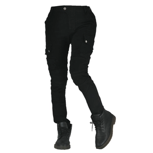 Detail of army green Kevlar motorcycle pants showing cargo pockets and knee accordion panels