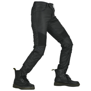 Detail of black motorcycle pants with protective knee pleats and slim-fit coated fabric