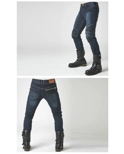 Detail of knee stretch panels and rear zipper pocket on blue motorcycle jeans