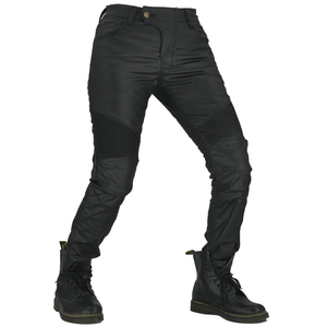 Close-up of black motorcycle riding pants with flexible accordion pleats at the knees