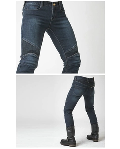 Detail of blue Kevlar motorcycle jeans with protective accordion panels and slim fit design