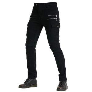 Detail of black motorcycle jeans with pleated knees and multiple zipper pockets