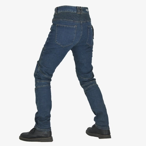 Detail of blue denim motorcycle jeans featuring elastic accordion panels for flexibility