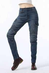 Detail of biker jeans with pleated knee panels and large cargo pockets in dark blue denim