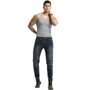 Detail of slim-fit Kevlar motorcycle jeans with horizontal pleats on knees in deep blue