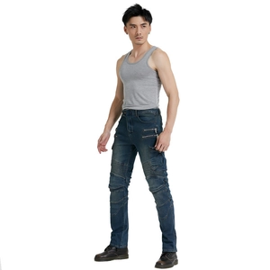 Detail view of motorcycle jeans featuring ribbed biker panels and metal zipper pockets