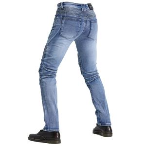 Detail of blue motorcycle jeans featuring flexible accordion panels on back and knees
