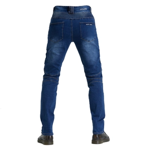 Detail of blue motorcycle jeans featuring flexible accordion panels on the back waist