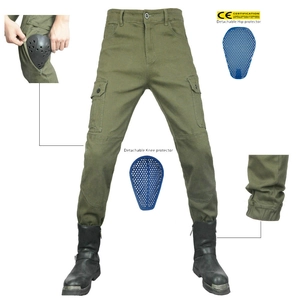 Detail of military green motorcycle cargo pants with removable knee and hip protectors