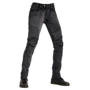 Detail view of motorcycle jeans with accordion stretch panels on the knees and thighs