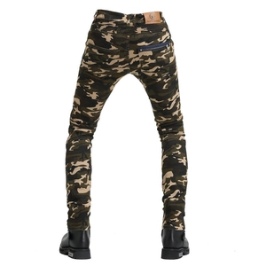 Detail view of motorcycle jeans with camo print, back zipper pocket and leather brand tag
