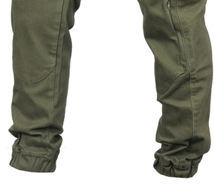 Detail of army green motorcycle jogger pants featuring reinforced knees and elastic cuffs