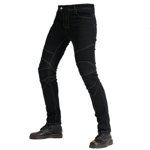 Detail of black motorcycle riding jeans featuring accordion stretch panels at the knees