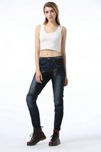 Close-up of women's motorcycle jeans with knee accordion panels and slim fit design