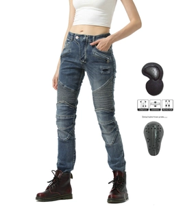 Detail of high-stretch denim motorcycle pants with shirring panels and knee protectors