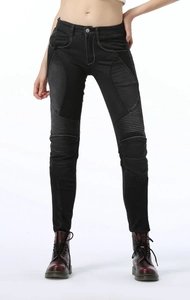 Detail of women's black motorcycle pants with white contrast stitching and knee pleats