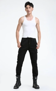 Detail of black cargo pants featuring adjustable drawstring waist and large flap pockets