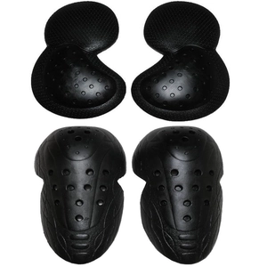 Macro view of black motorcycle protective gear with breathable ventilation holes