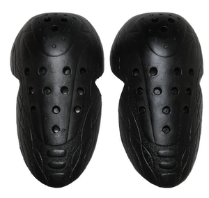 Close-up of black breathable motorcycle knee pads with ergonomic ventilation holes