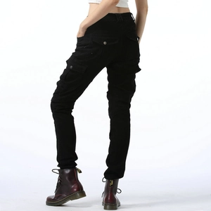 Rear view of women's black slim fit cargo motorcycle pants with large flap pockets