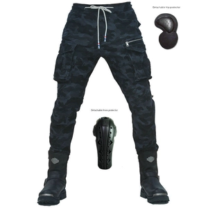 Detail of cargo motorcycle pants with detachable knee and hip armor pads set