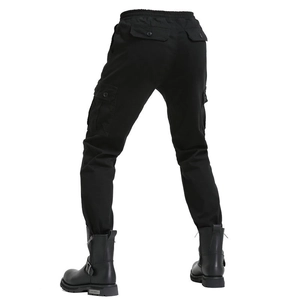 Detailed back view of black motorcycle pants showing flap pockets and elastic waist