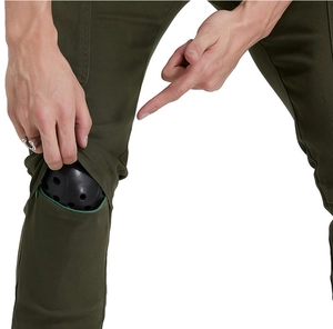 Detail view of tactical pants with knee pad insert pocket and protective pad display