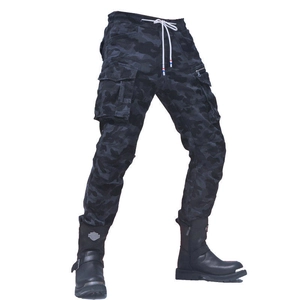 Detail of cargo pants showing side pockets, camouflage pattern, and adjustable drawstring