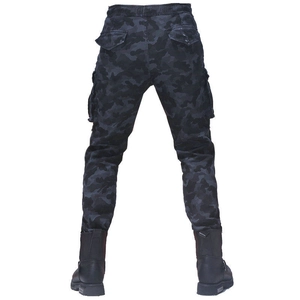 Detail view of motorcycle cargo pants with dark camo pattern and functional rear pockets