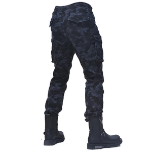 Detail of dark camouflage cargo motorcycle pants with large side pockets and cuffs