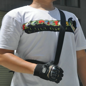 Close-up of black motorcycle gloves with carbon fiber hard knuckle protection for racing