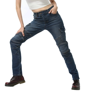 Detail of blue biker jeans with multi-pockets and accordion stretch panels for motorcycle riding