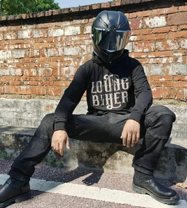 Close-up of LOUNG BIKER print on black fleece motorcycle hoodie with biker helmet