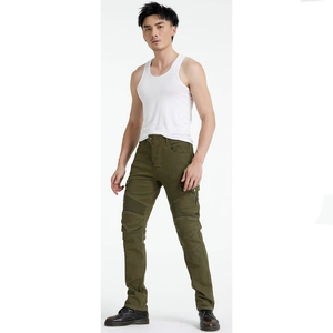 Detail view of military green motorcycle pants with reinforced cargo pockets and knee pleats