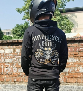 Detail of men's motorcycle hoodie featuring vintage skull print and graphic back design