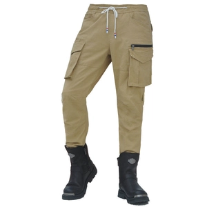 Detail view of khaki multi-pocket cargo pants with drawstring waist and zipper accents