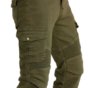 Detail view of military green cargo pants with accordion panels and utility pocket
