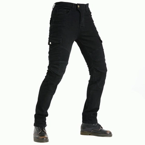 Detail view of motorcycle cargo pants with reinforced knee armor and utility pockets