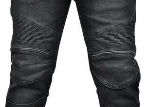 Detail shot of pleated accordion knees on slim fit dark gray motorcycle riding jeans