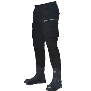 Detail of slim-fit biker cargo pants featuring multi-pocket design and side zippers
