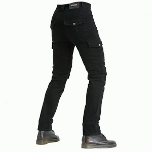 Detail of motorcycle cargo pants featuring reinforced knee pleats and large flap pockets