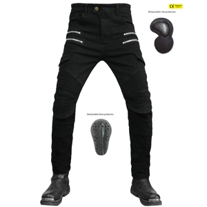 Detail view of black motorcycle cargo pants featuring flexible knee panels and CE armor pads