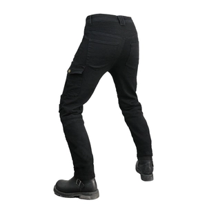 Detail of black motorcycle cargo pants with stretch panels and side pockets for bikers