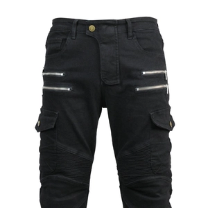 Detail of black motorcycle cargo pants with pleated knees and silver zipper pockets