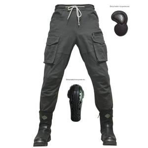 Detailed view of motorcycle riding pants with detachable knee and hip armor pads