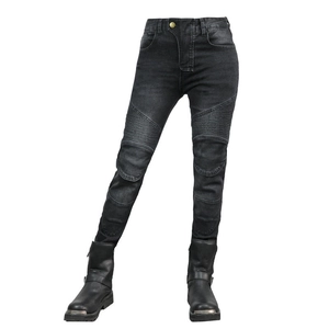 Detail view of motorcycle jeans with protective knee pleats and reinforced fabric texture