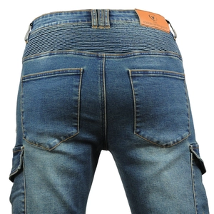 Blue motorcycle jeans featuring elastic accordion panels and cargo pockets for riders