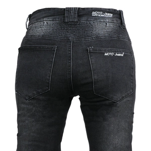 Detail of female motorcycle jeans featuring elastic waist pleats and back pockets